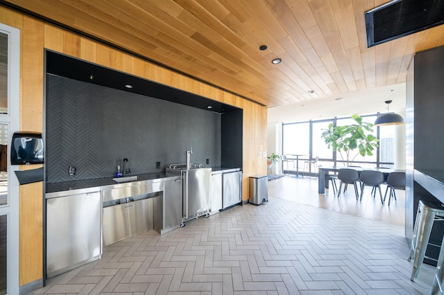 10 Provost St Unit 416, Jersey City, NJ 07302 - kitchen with wood ceiling, modern cabinets, and backsplash