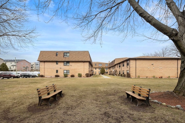 view of yard featuring a residential view