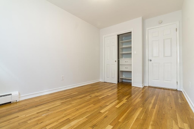 226 57th St, West New York, NJ 07093 - unfurnished bedroom featuring light wood-style flooring and a closet