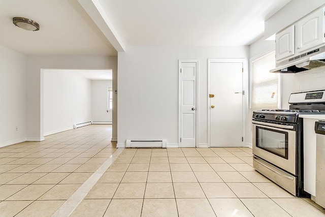 226 57th St, West New York, NJ 07093 - kitchen featuring stainless steel range with gas cooktop, under cabinet range hood, baseboard heating, and white cabinets