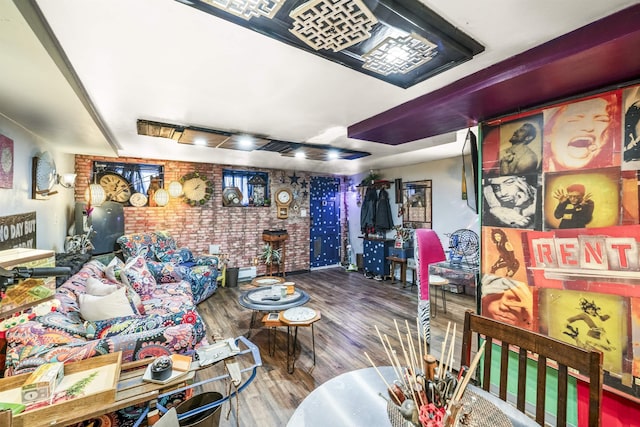 209 48th St Unit A, Union City, NJ 07087 - living room with wood finished floors and brick wall