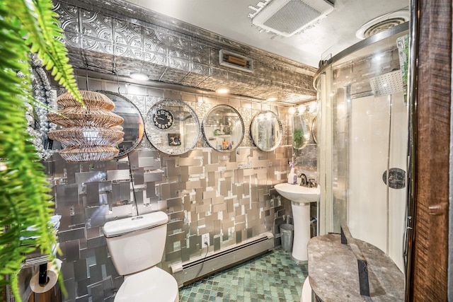 209 48th St Unit A, Union City, NJ 07087 - bathroom featuring baseboard heating, tile walls, and a shower