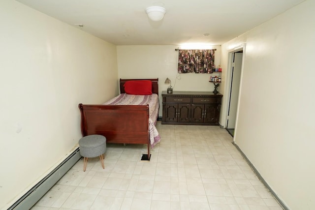 704 90th St, North Bergen, NJ 07047 - bedroom with baseboard heating and light floors