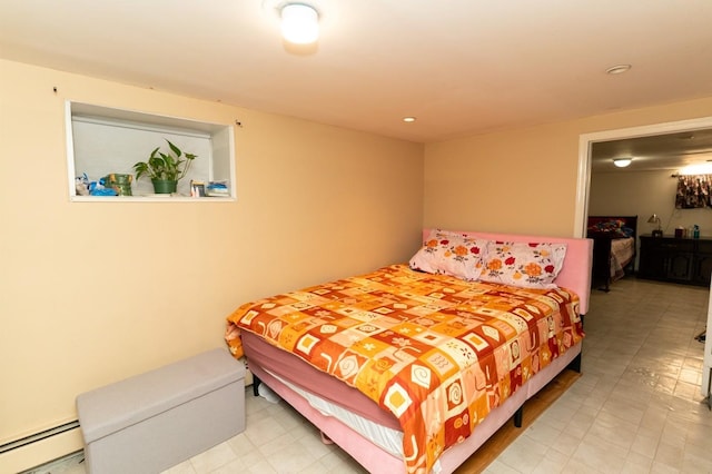 704 90th St, North Bergen, NJ 07047 - bedroom with baseboard heating, light flooring, and recessed lighting