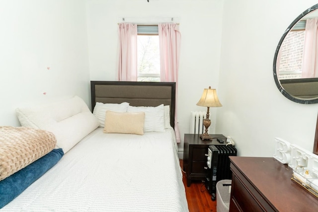 704 90th St, North Bergen, NJ 07047 - bedroom featuring dark wood-type flooring