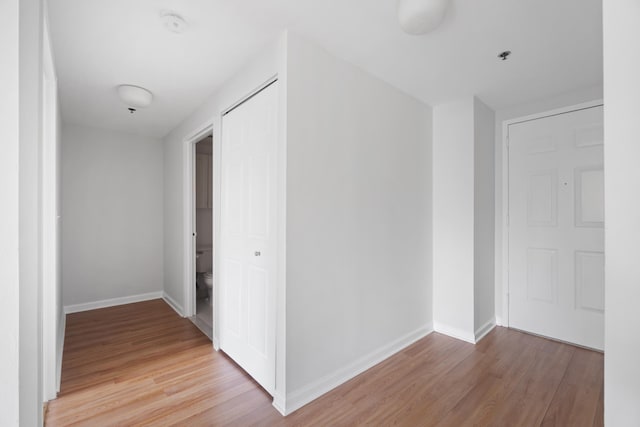 1 2nd St Unit 314, Jersey City, NJ 07302 - corridor with light wood-style floors and baseboards