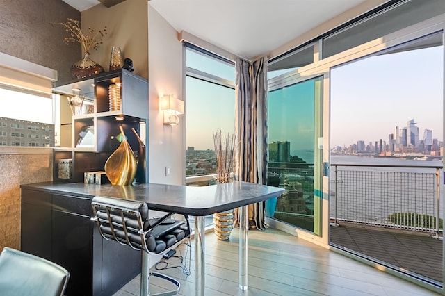 225 River St Unit 1901, Hoboken, NJ 07030 - dining room with a skyline view, wood finished floors, and floor to ceiling windows
