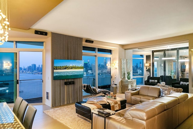 225 River St Unit 1901, Hoboken, NJ 07030 - living room with wood finished floors and a chandelier