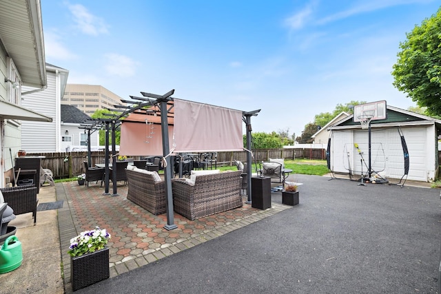 view of patio featuring outdoor lounge area, a fenced backyard, a pergola, an outbuilding, and outdoor dining area