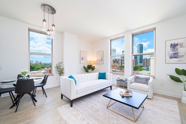 10 Regent St Unit 807, Jersey City, NJ 07302 - living room featuring a skyline view and light wood-style flooring