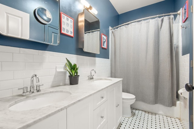 9 Coles St Unit 7, Jersey City, NJ 07302 - full bathroom with double vanity, shower / bathtub combination with curtain, and tile walls