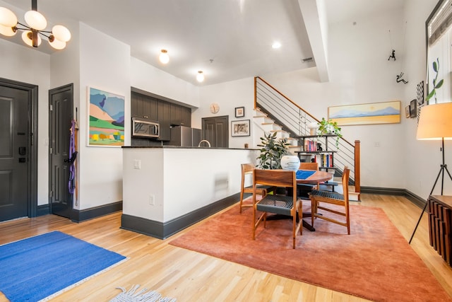9 Coles St Unit 7, Jersey City, NJ 07302 - dining space featuring light wood finished floors and stairs