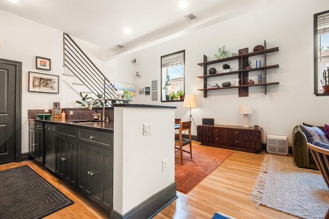 9 Coles St Unit 7, Jersey City, NJ 07302 - hallway with light wood finished floors, stairway, and recessed lighting
