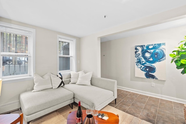 98 Bright St Unit 1G, Jersey City, NJ 07302 - living room with baseboard heating and baseboards
