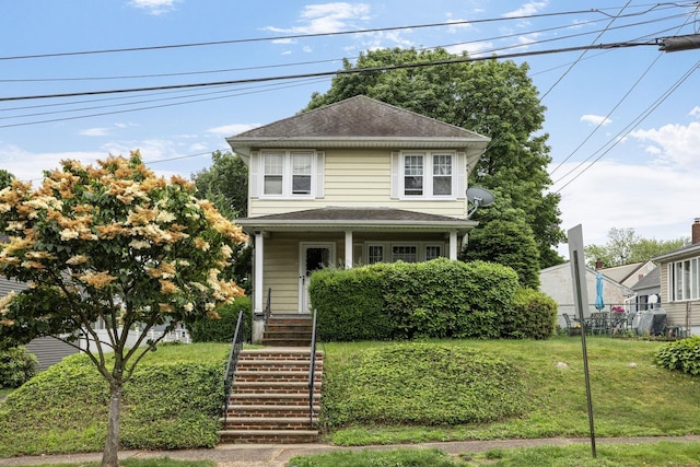 47 Darling Ave, Bloomfield, NJ 07003 - american foursquare style home featuring stairway, a porch, a front yard, and roof with shingles