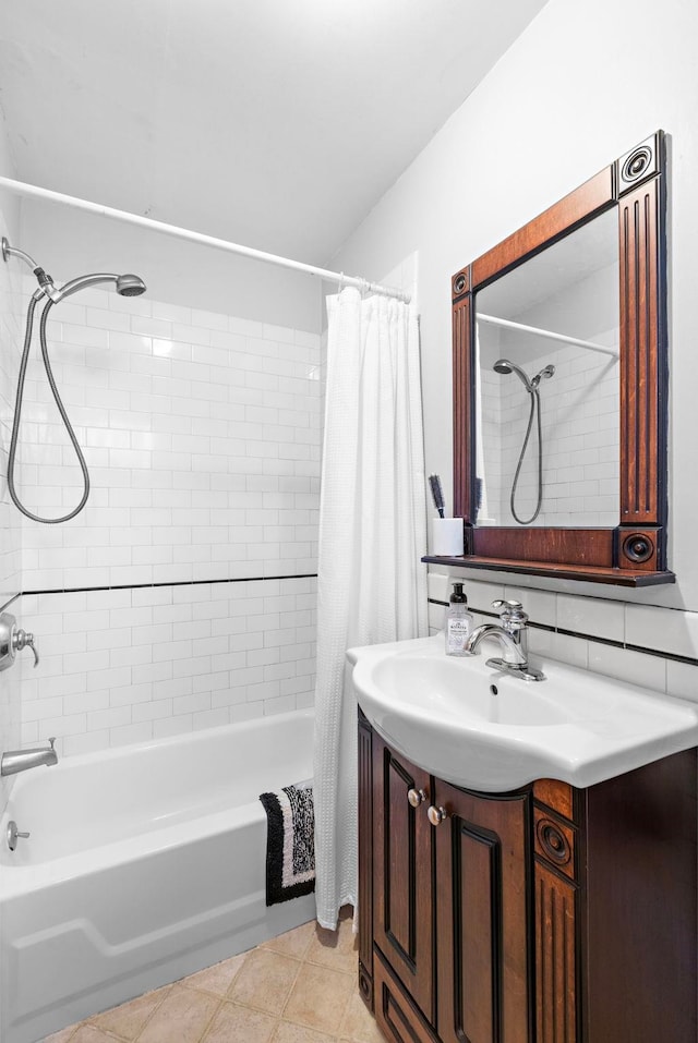 bathroom with shower / bath combo, vanity, and tile patterned floors