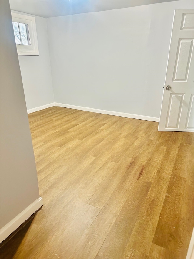 basement with light wood-type flooring