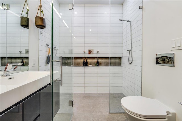 277 2nd St Unit 1, Jersey City, NJ 07302 - bathroom featuring toilet, a shower stall, vanity, and tile patterned floors