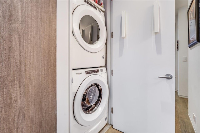 277 2nd St Unit 1, Jersey City, NJ 07302 - clothes washing area featuring stacked washer / drying machine