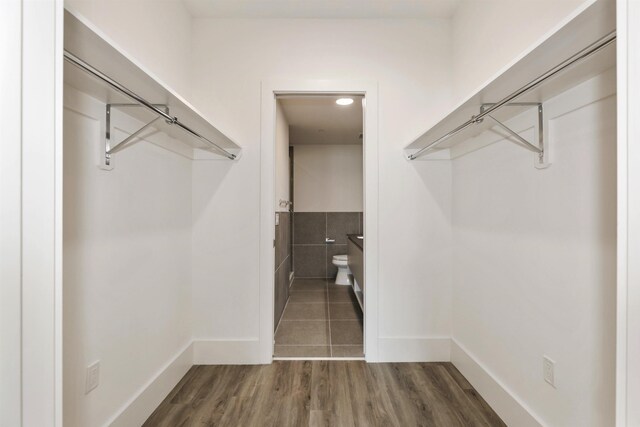 391 Palisade Ave Unit 202, Jersey City, NJ 07307 - spacious closet featuring wood finished floors