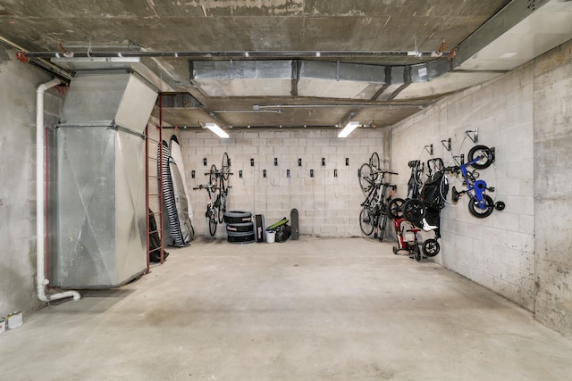 391 Palisade Ave Unit 202, Jersey City, NJ 07307 - garage featuring concrete block wall