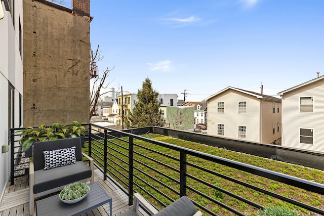 391 Palisade Ave Unit 202, Jersey City, NJ 07307 - balcony featuring a residential view