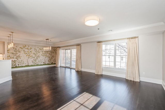 unfurnished room featuring crown molding and dark wood-type flooring