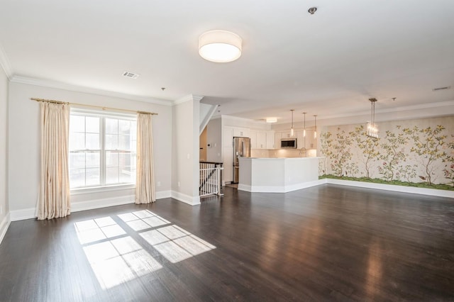 unfurnished living room featuring ornamental molding and dark hardwood / wood-style flooring