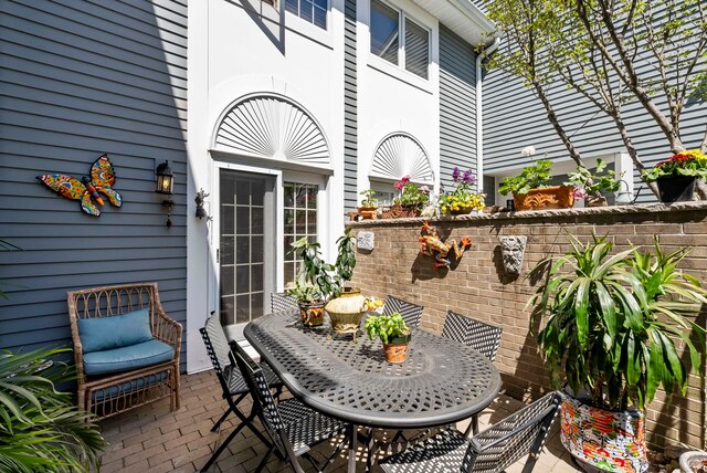 view of patio featuring outdoor dining space
