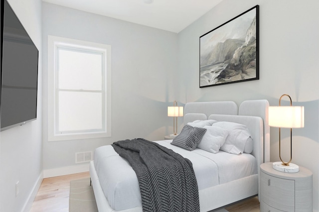 97 Irving St Unit 1, Jersey City, NJ 07307 - bedroom featuring wood finished floors and baseboards