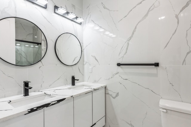 97 Irving St Unit 1, Jersey City, NJ 07307 - full bath featuring tile walls, double vanity, and toilet
