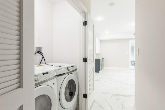 97 Irving St Unit 1, Jersey City, NJ 07307 - clothes washing area with light marble finish flooring, separate washer and dryer, and recessed lighting