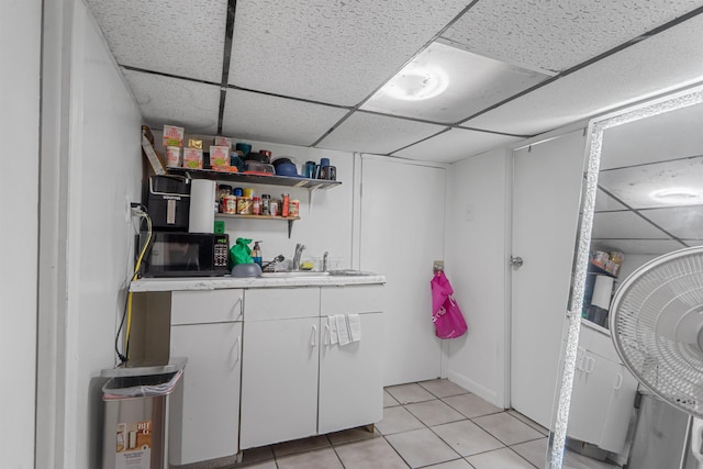 6910 Jackson St, Guttenberg, NJ 07093 - washroom with light tile patterned floors and bar area