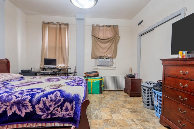 6910 Jackson St, Guttenberg, NJ 07093 - bedroom featuring radiator, stone finish floors, and cooling unit