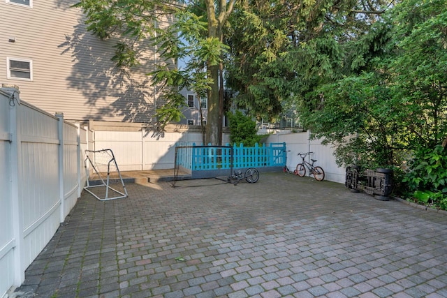 6910 Jackson St, Guttenberg, NJ 07093 - fenced backyard with a patio