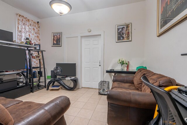 6910 Jackson St, Guttenberg, NJ 07093 - living area featuring tile patterned floors and an office area