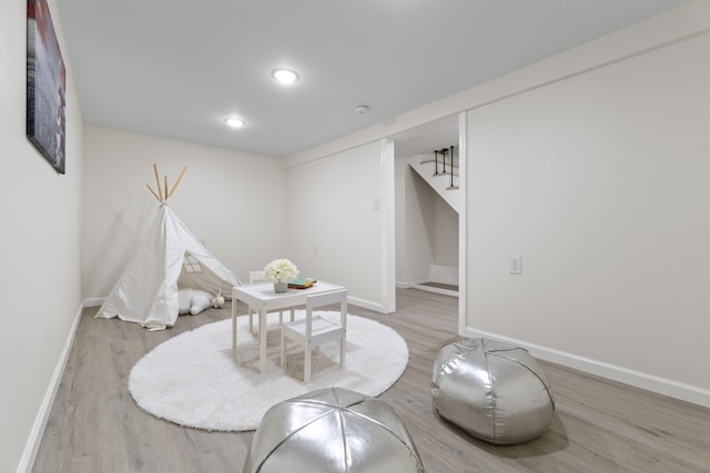 playroom featuring recessed lighting, baseboards, and wood finished floors