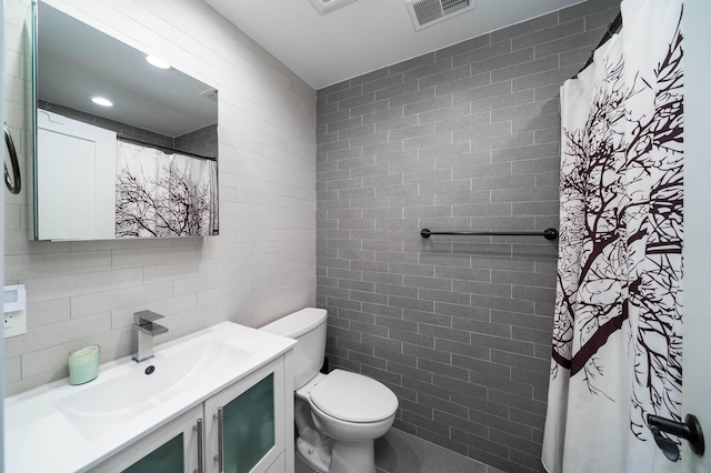 61 Skillman Ave Unit 3A, Jersey City, NJ 07306 - bathroom featuring vanity, tile walls, and a shower with shower curtain