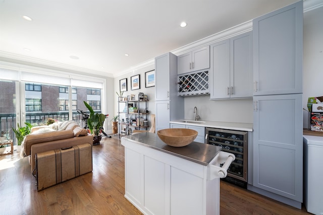 61 Skillman Ave Unit 3A, Jersey City, NJ 07306 - kitchen featuring beverage cooler, crown molding, dark wood-style floors, recessed lighting, and gray cabinets