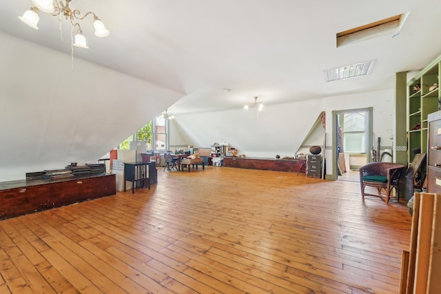 74 Sherman Pl, Jersey City, NJ 07307 - additional living space featuring wood-type flooring and lofted ceiling