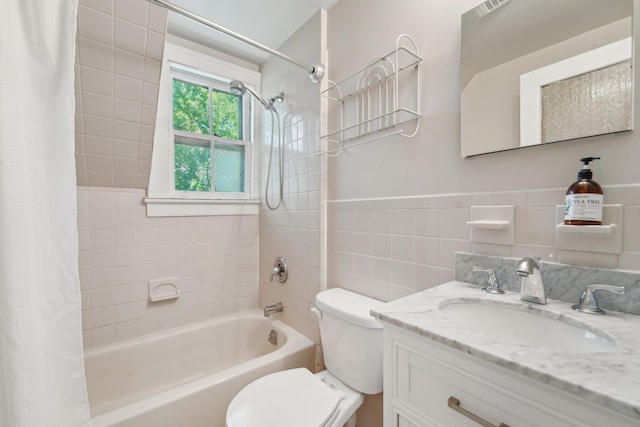 74 Sherman Pl, Jersey City, NJ 07307 - bathroom featuring shower / bath combination with curtain, toilet, tile walls, and vanity