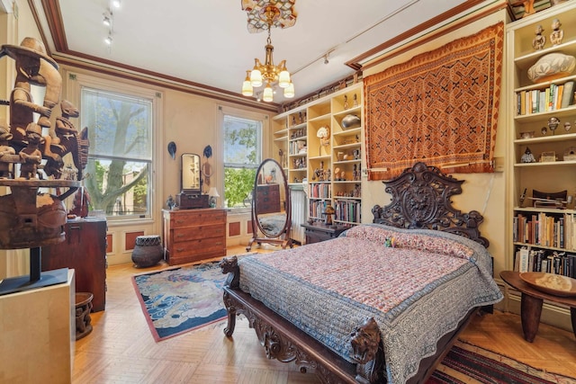 74 Sherman Pl, Jersey City, NJ 07307 - bedroom featuring rail lighting, a chandelier, and crown molding