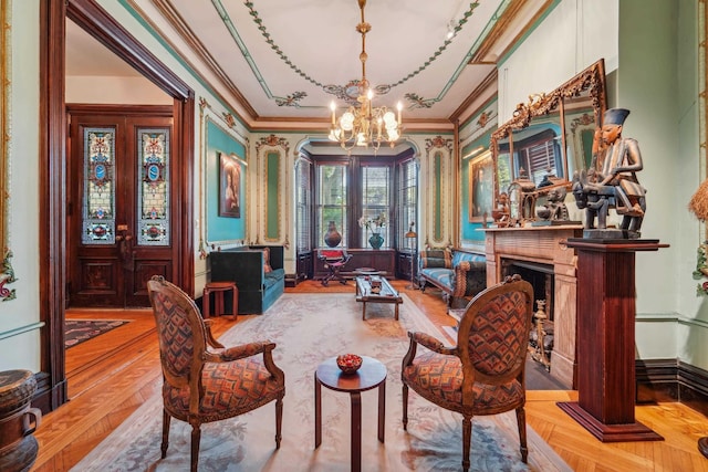 74 Sherman Pl, Jersey City, NJ 07307 - living area with a chandelier, crown molding, wood finished floors, and a fireplace