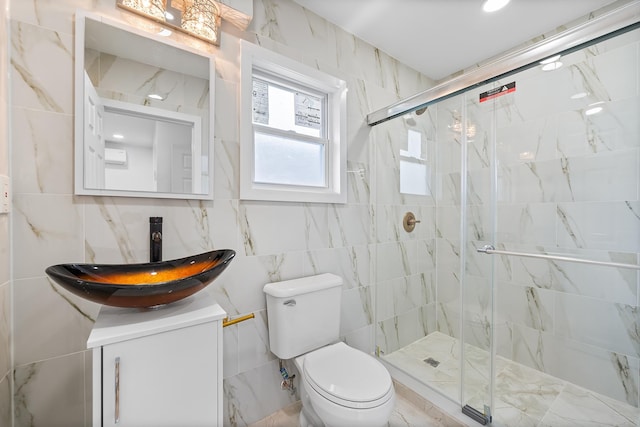 1 Sisson Ct, Bayonne, NJ 07002 - full bath featuring tile walls, vanity, toilet, and a marble finish shower