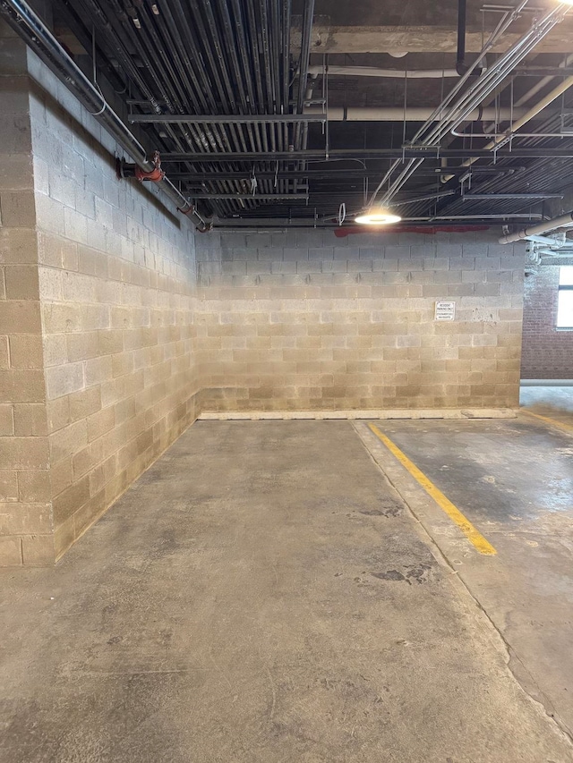 720 Clinton St Unit 6-03, Hoboken, NJ 07030 - parking deck featuring concrete block wall