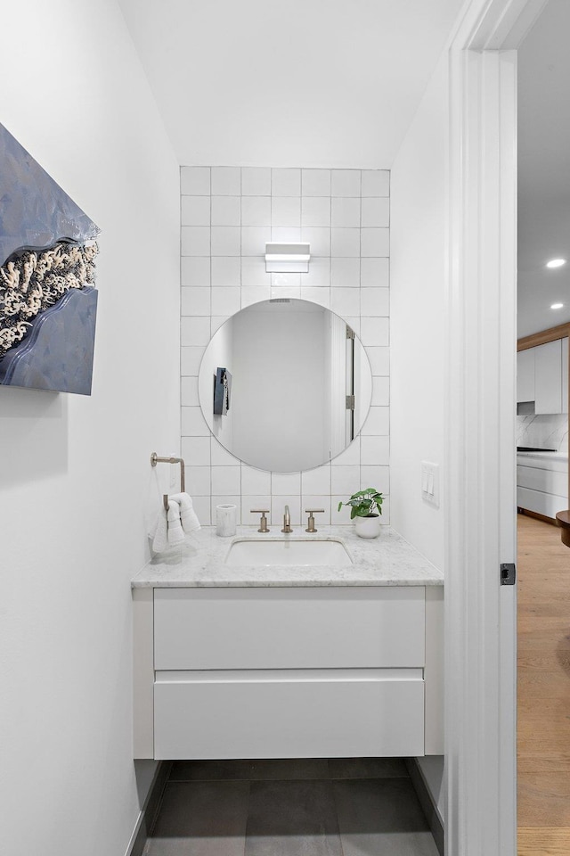 720 Clinton St Unit 6-03, Hoboken, NJ 07030 - bathroom featuring vanity and tile walls