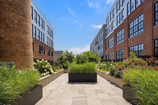 720 Clinton St Unit 6-03, Hoboken, NJ 07030 - view of property's community with a patio area