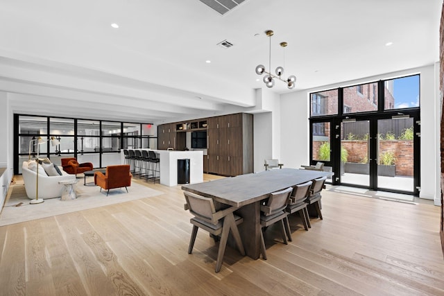 720 Clinton St Unit 6-03, Hoboken, NJ 07030 - dining area with light wood finished floors and recessed lighting
