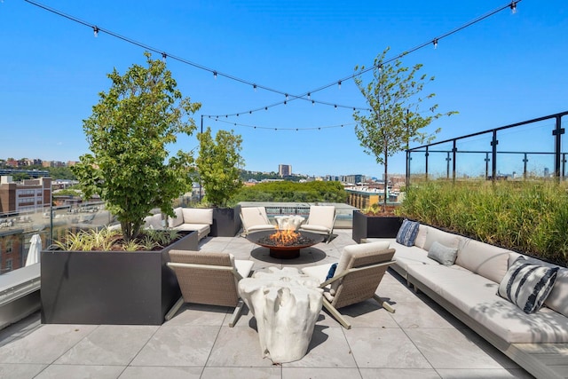 720 Clinton St Unit 6-03, Hoboken, NJ 07030 - view of patio / terrace with an outdoor living space with a fire pit and a city view