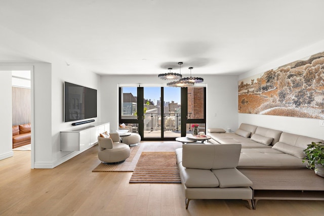 720 Clinton St Unit 6-03, Hoboken, NJ 07030 - living room featuring light wood-style flooring